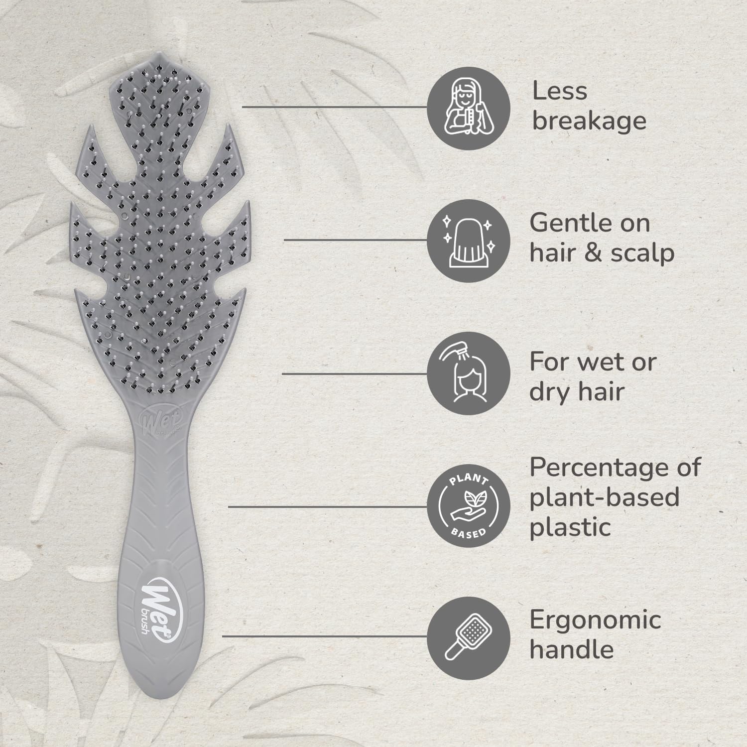 Wet Brush Go Green Detangler in use on wet hair for smooth detangling.