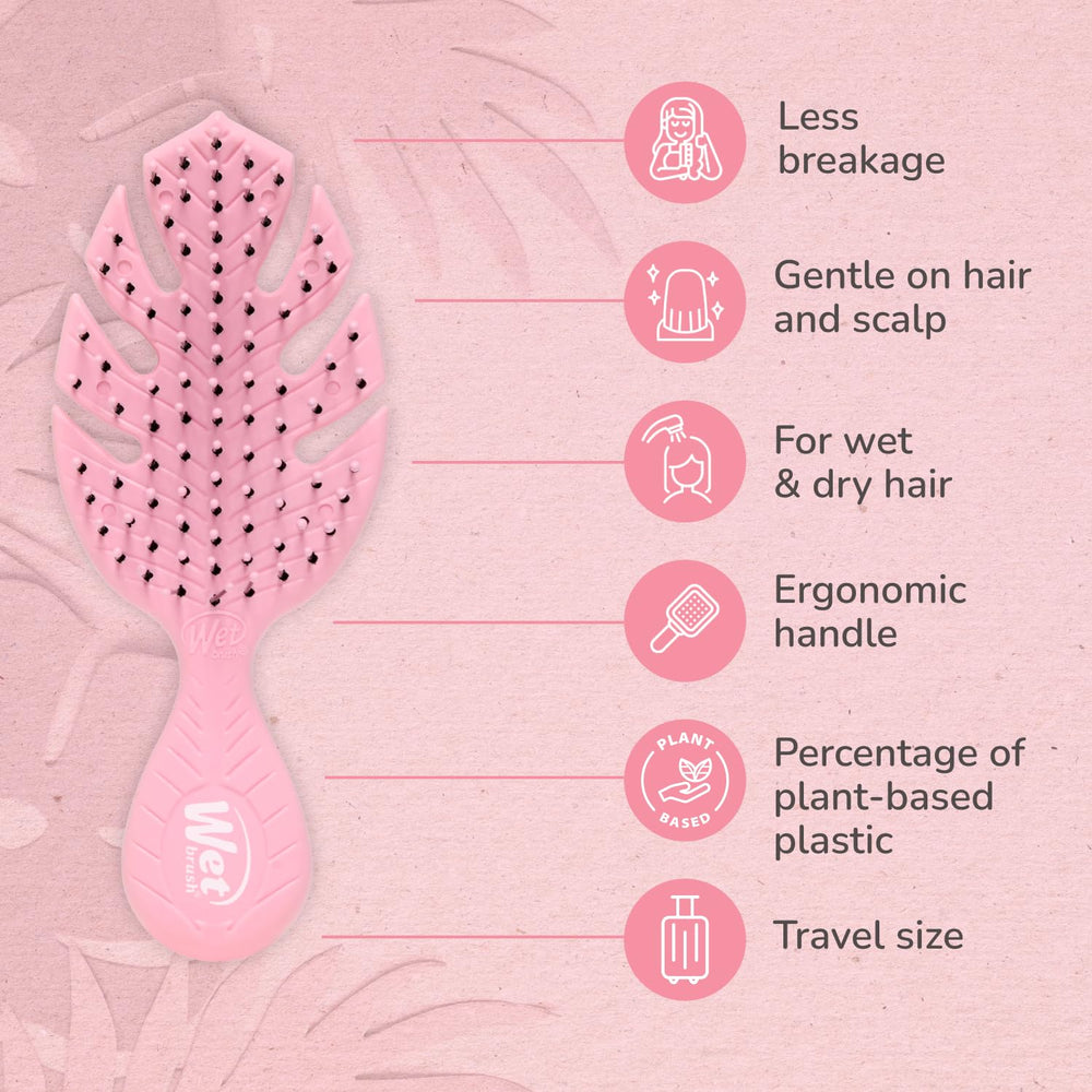 Wet Brush Go Green Mini Detangler Pink packaging highlights eco-friendly materials