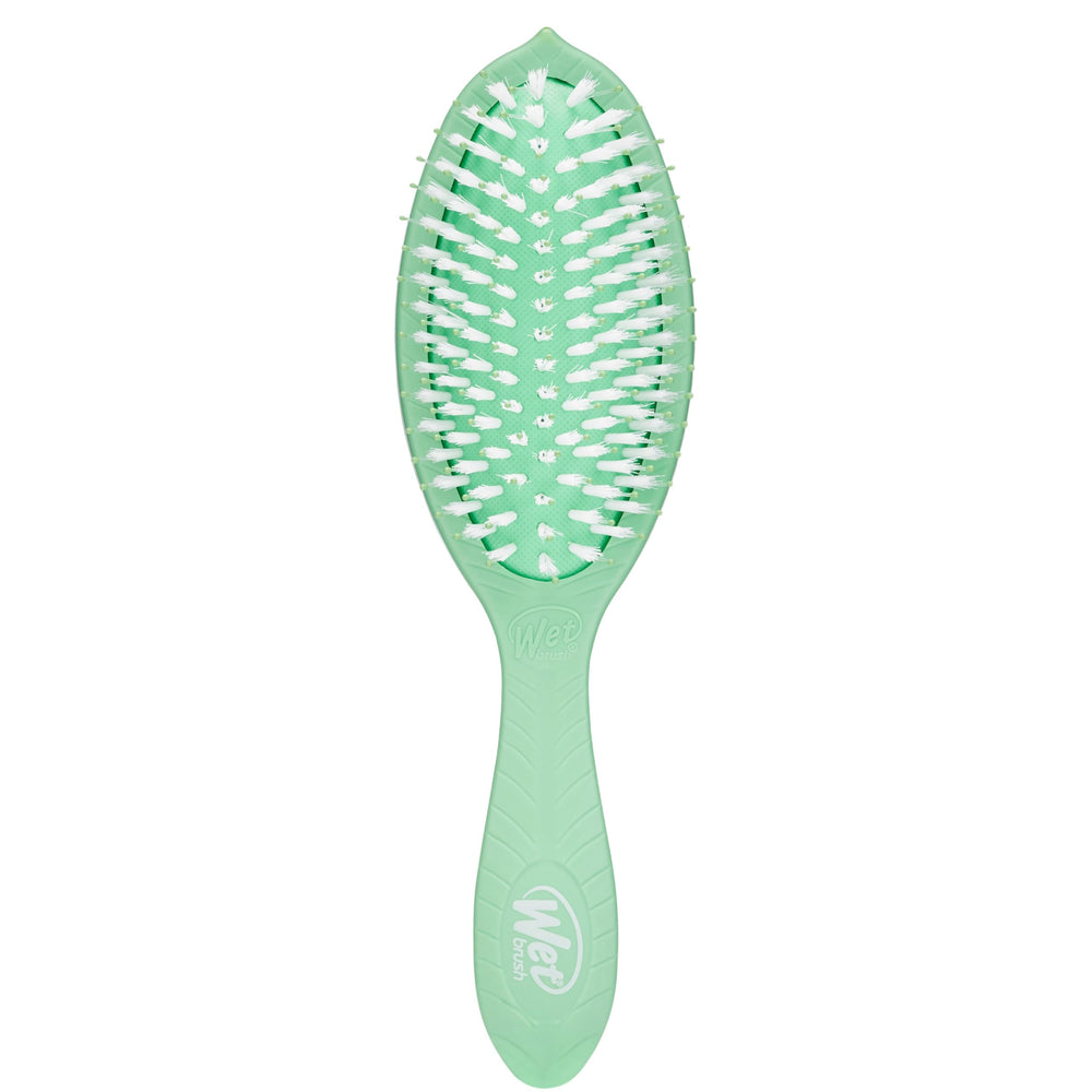 Wet Brush Go Green tea tree oil bottle for refreshing styling.