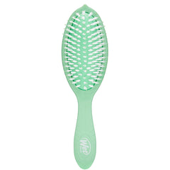 Wet Brush Go Green tea tree oil bottle for refreshing styling.