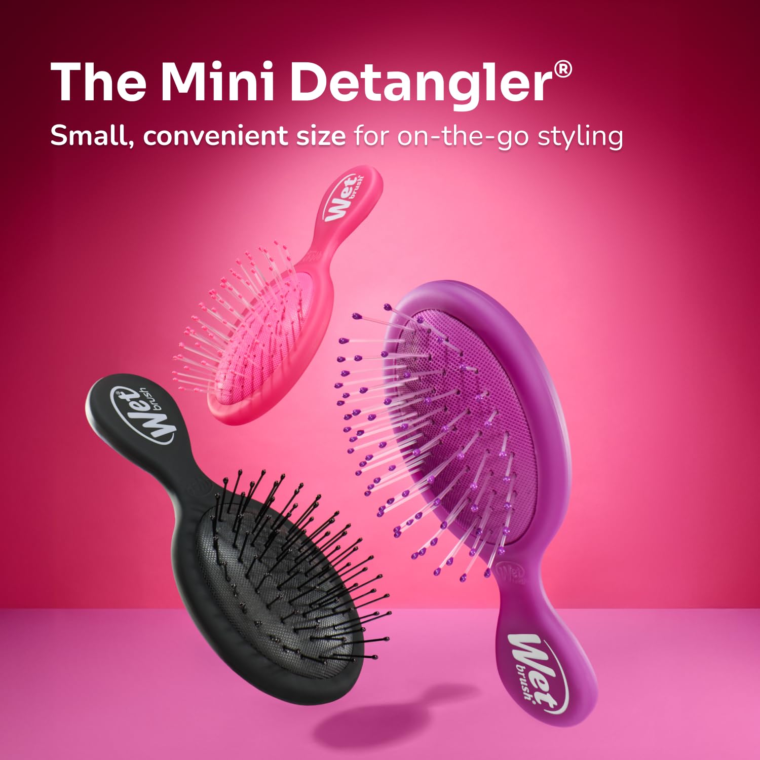 Wet Brush Mini Detangler easy-to-use travel brush with bright cherry color.
