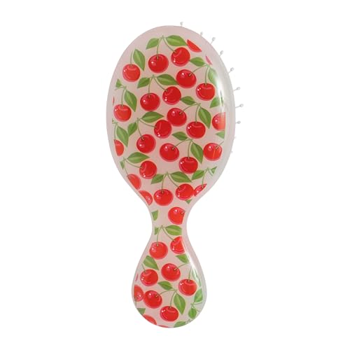 Wet Brush Mini Detangler in hand detangles wet hair with minimal pulling.