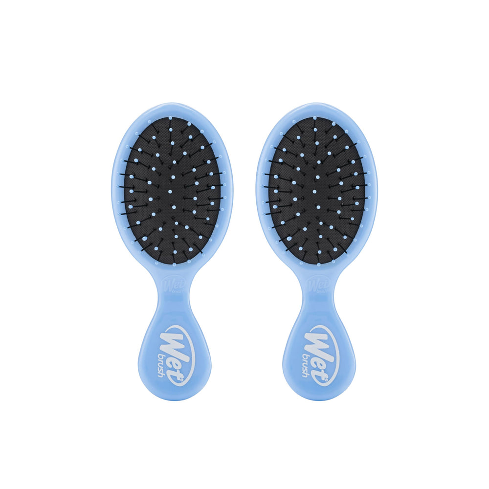 Wet Brush Mini Detangler in Sky front view with flexible bristles gliding through hair