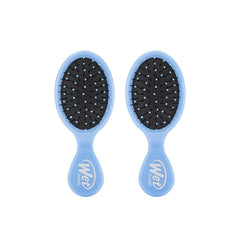 Wet Brush Mini Detangler in Sky front view with flexible bristles gliding through hair