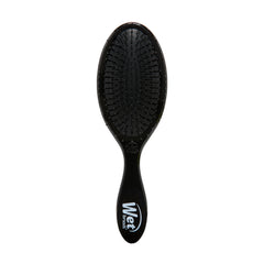 Wet Brush Original Detangler close-up with IntelliFlex bristles easing knots