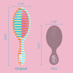 Wet Brush Original Detangler used on curly hair for gentle detangling.