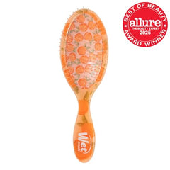 Wet Brush Original Detangler Peach Tutti Frutti knot release on wet hair with gentleness.