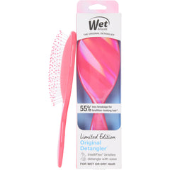 Wet Brush Original Detangler Prismatic Glow Pink detangles gently on damp or dry hair.