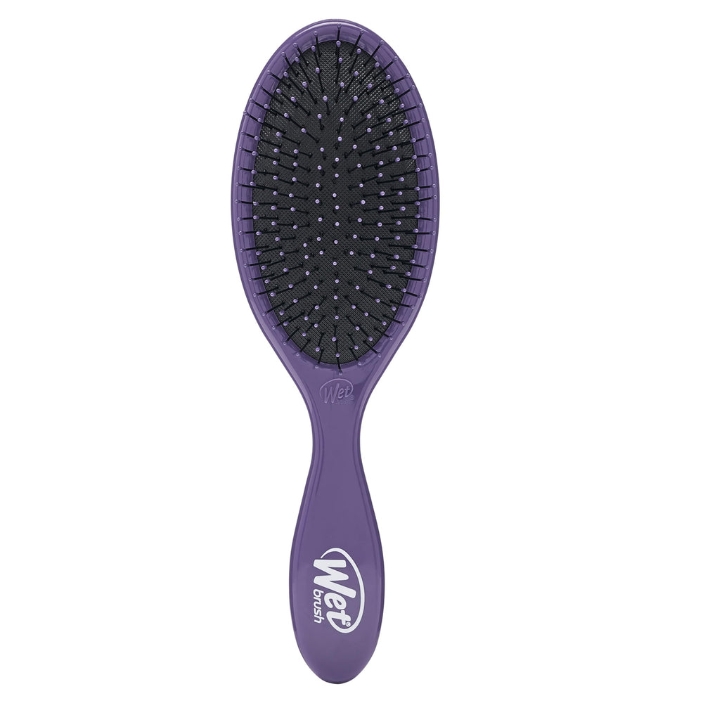 Wet Brush Original Detangler Purple close-up showing gentle detangling for knot-prone hair.