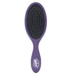 Wet Brush Original Detangler Purple close-up showing gentle detangling for knot-prone hair.