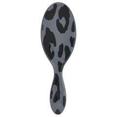 Wet Brush Original Detangler Safari Leopard brush close-up gliding through tangles