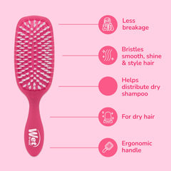 Wet Brush Smooth Styler pink frost in action smoothing hair with a gentle glide.