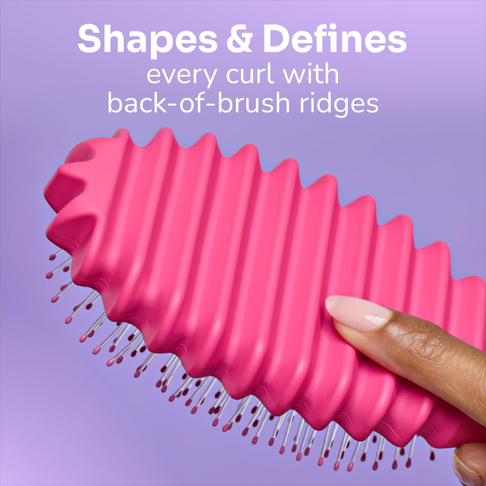 Compact, travel-ready Wet Brush design ideal for showers, gym bags, and carry-ons.