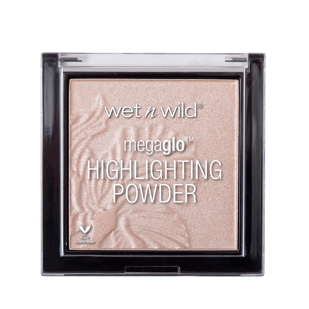 Wet n Wild MegaGlo Highlighting Powder compact swatch shows radiant, pearlescent glow on the skin