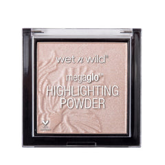 Wet n Wild MegaGlo Highlighting Powder compact swatch shows radiant, pearlescent glow on the skin