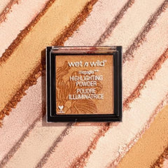 Wet n Wild MegaGlo browbone highlight for lift and sparkle.