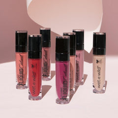 Lips appear glossy, then dry to a rich matte with Wet n Wild Catsuit lipstick