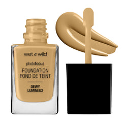 Wet n Wild Photo Focus Dewy Liquid Foundation Desert Beige bottle showcases shade and radiant glow.