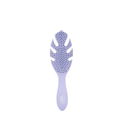 Wet Brush Go Green Detangler Purple close-up gliding through knots