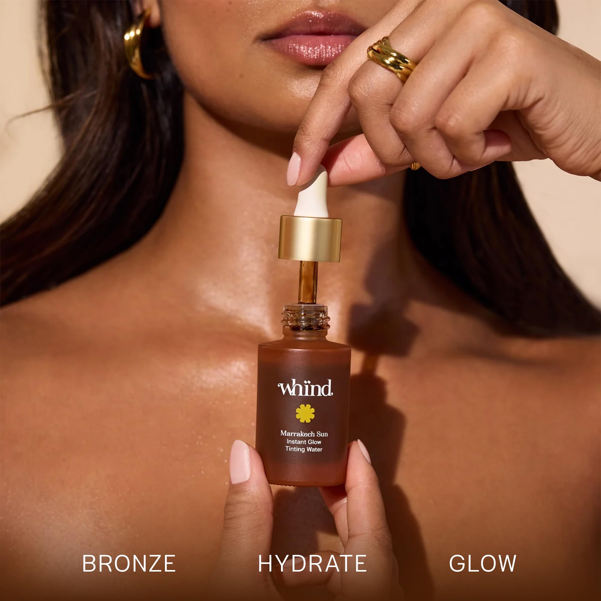 WHIND Marrakech Sun Tinting Water with Hyaluronic Acid nourishes while bronzing.