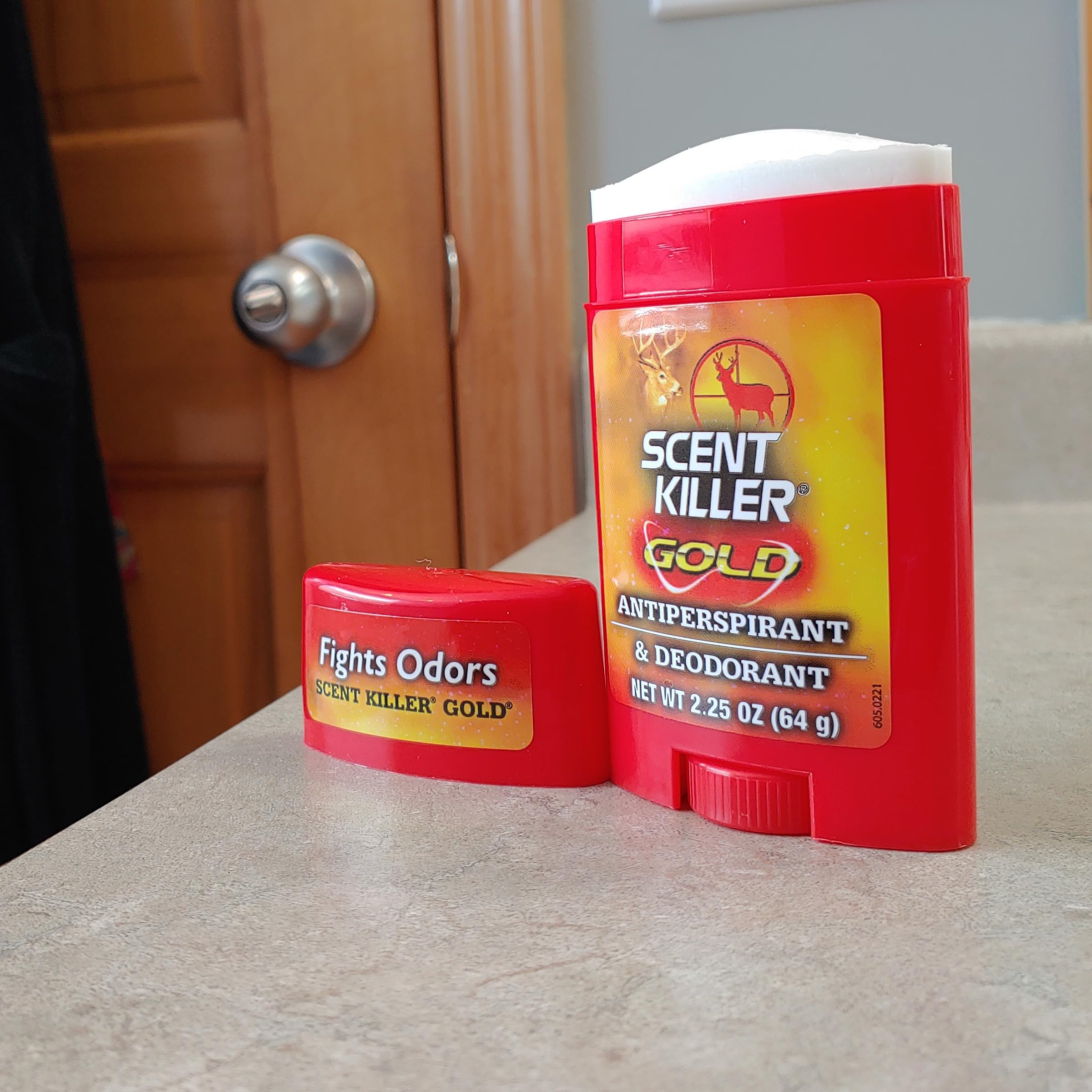 Etiqueta de Scent Killer Gold, información clara sobre uso y beneficios.