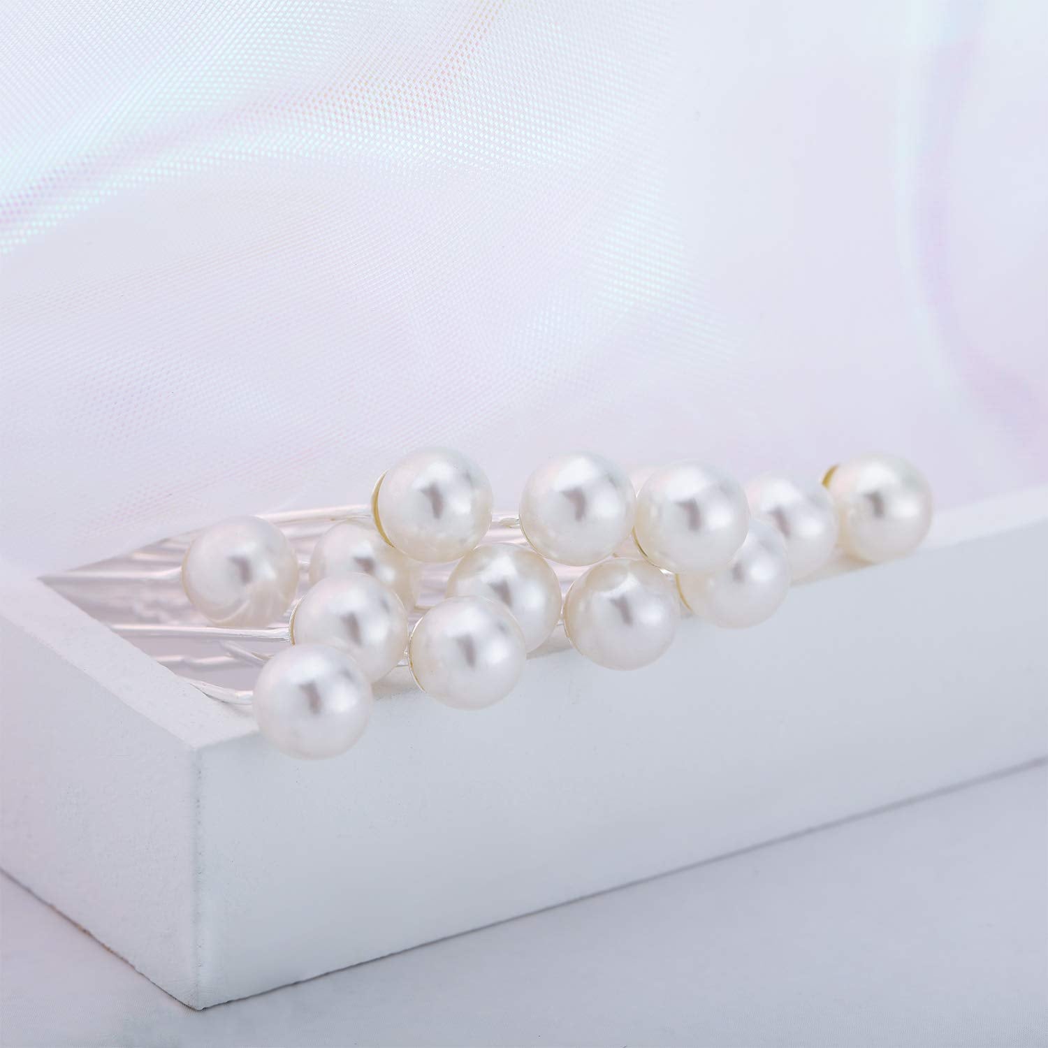 Bridal hair accessory set adds charm to updos and photos.