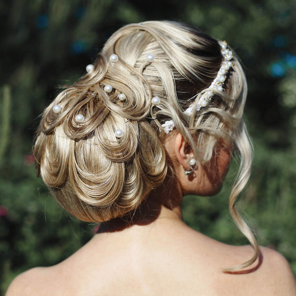Pearl headpins with 8 mm pearls for secure, elegant wedding styling.
