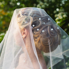 WILLBOND white pearl bobby clips ideal for bridesmaids' hairstyles.