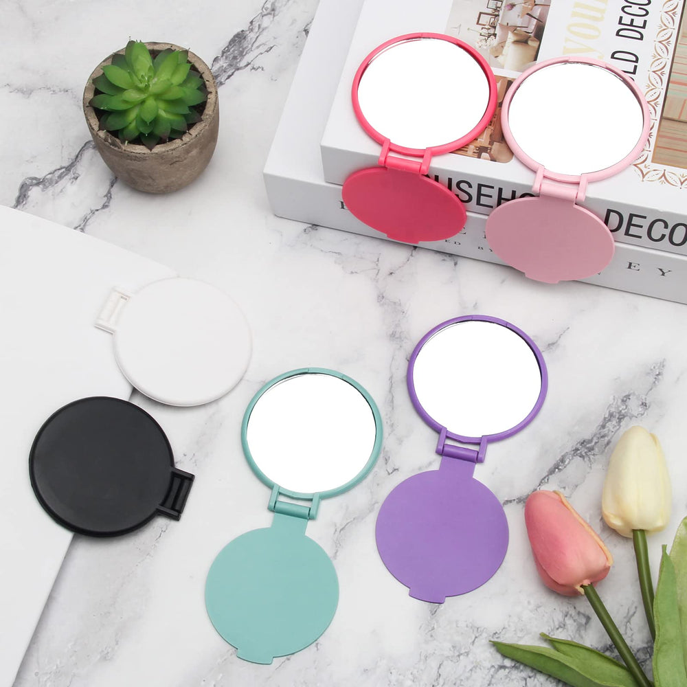 Windspeed green mini folding mirror adds color to travel kits.