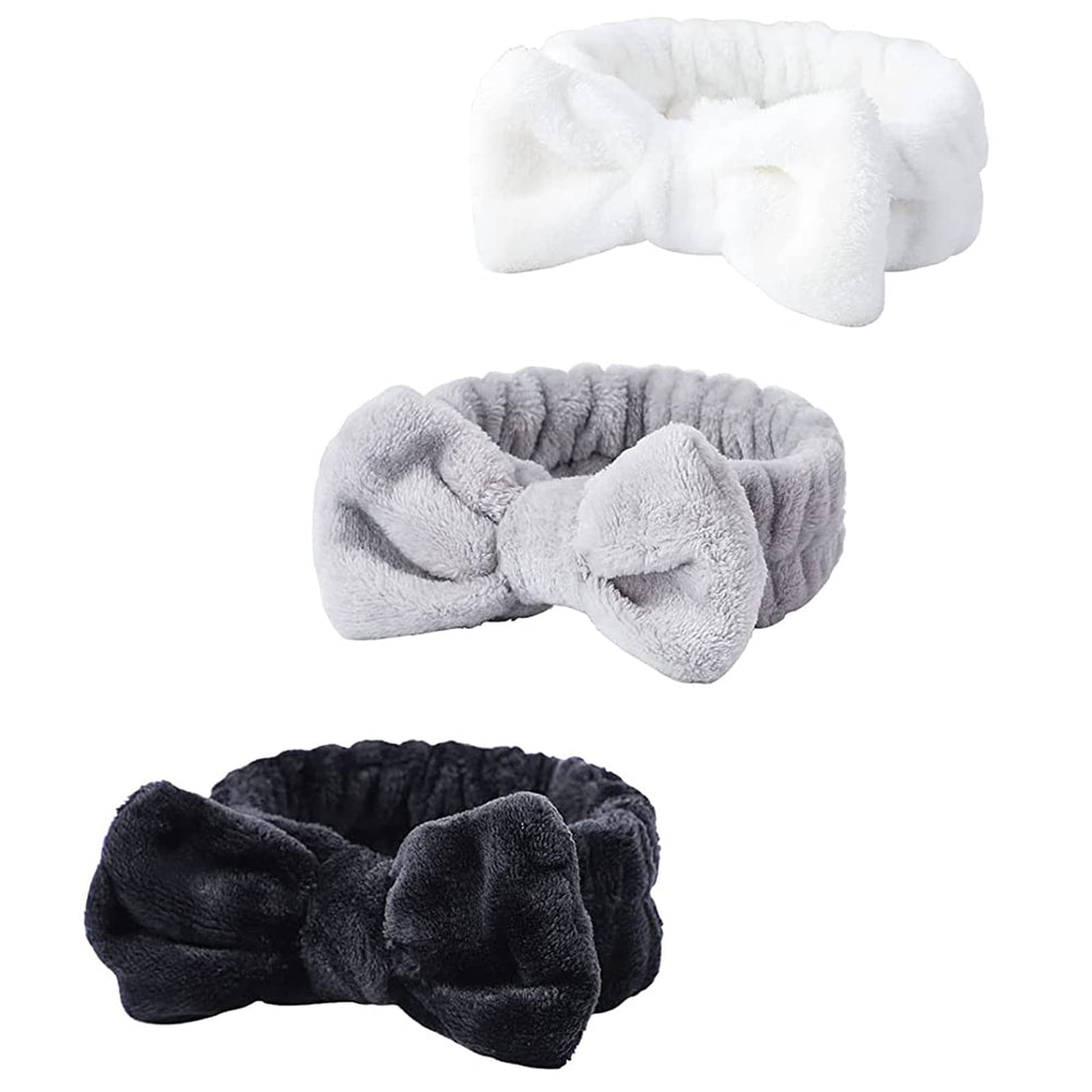 WSYUB Spa Headband with white bow keeps hair away during skincare.