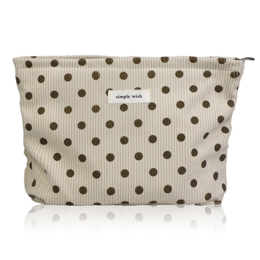 Wudygirl makeup bag in beige polka dot with corduroy texture for travel organization.