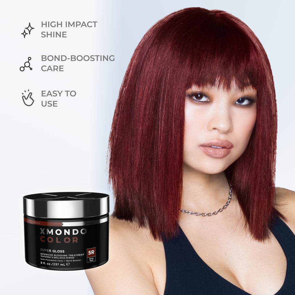 Hair being coated with XMONDO Color 5R mask for even saturation