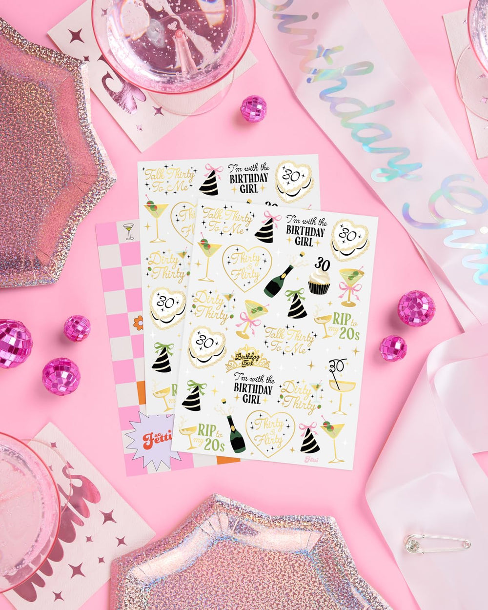 xo Fetti assorted tattoo designs for a customized, wearable party vibe.