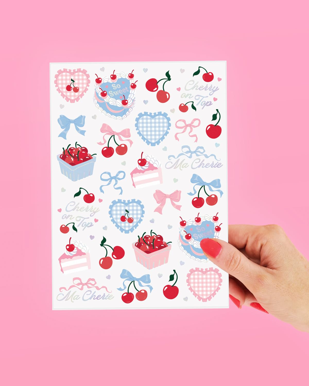 xo Fetti cake, bow, and heart designs – festive tablescape accents.