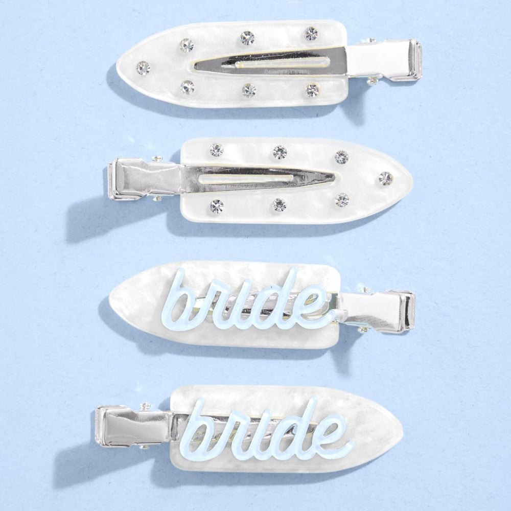 Clips xo Fetti blancos con destellos y cristales para un acabado elegante.