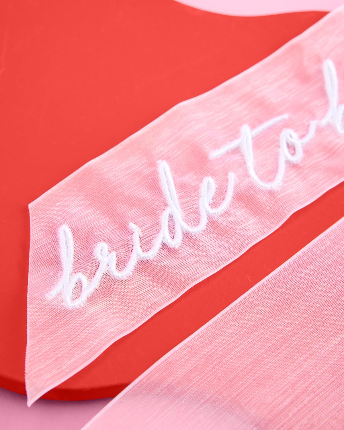 ivory organza bow as a versatile bachelorette party accessory on a mirror display