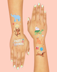 xo, Fetti kids applying tattoos at a party for instant fun