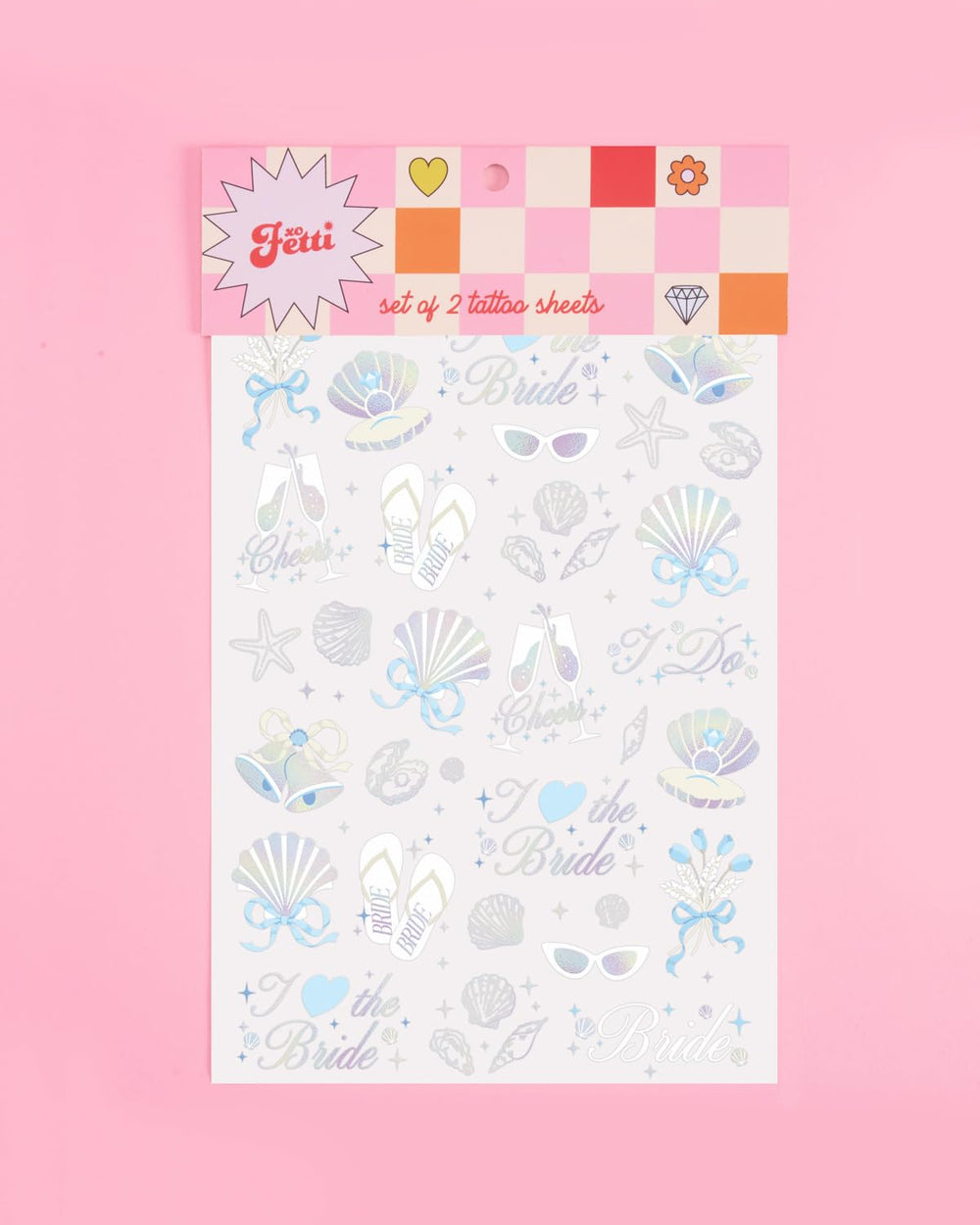 xo, Fetti seashells and bells designs elevate beach shower styling.