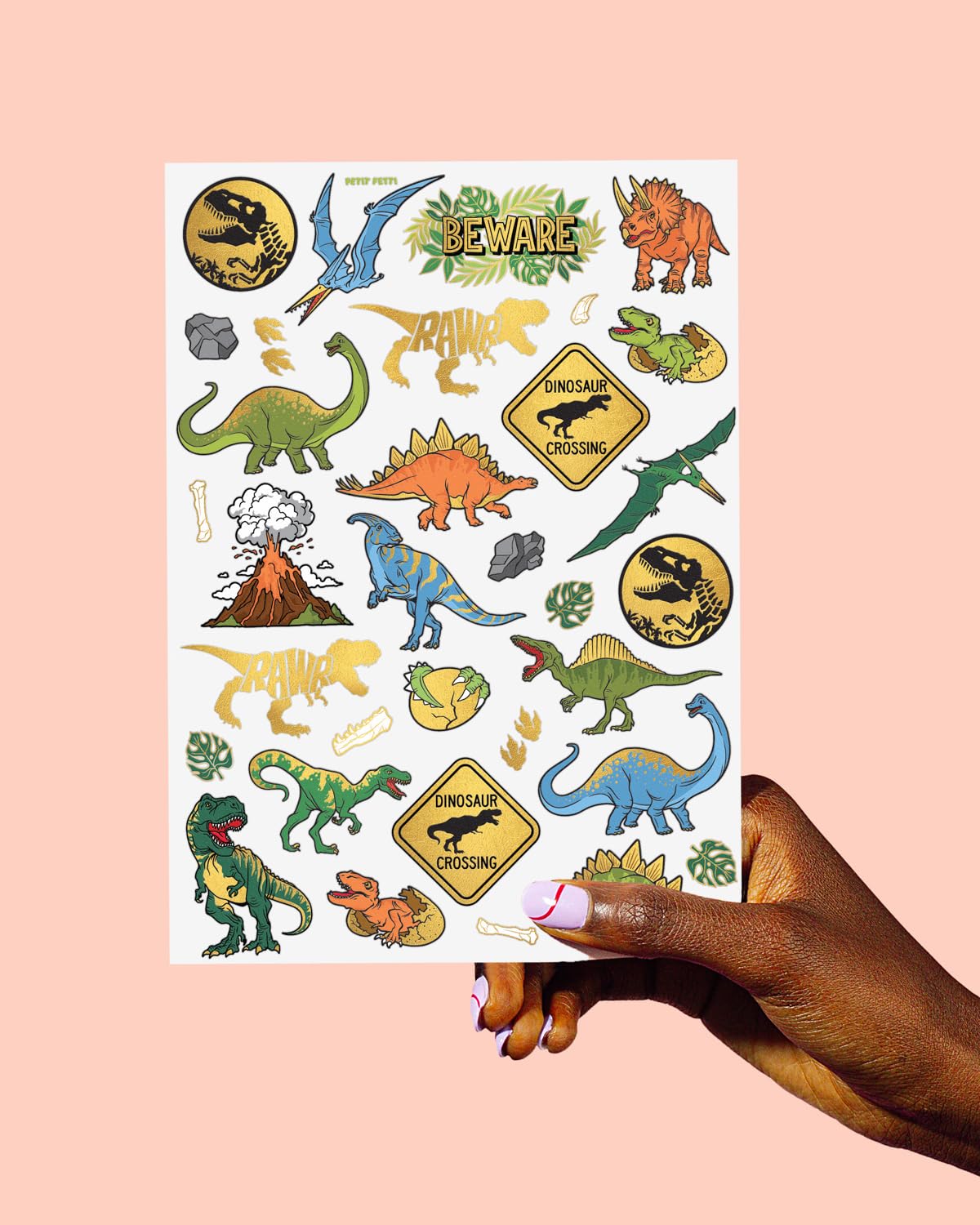 Tatuaje xo Fetti Huellas de dinosaurio doradas para actividades.