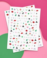 xo Fetti tiara and rainbow nail sticker for cute celebratory manicures.
