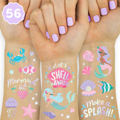 xo, Fetti under the sea mermaid foil tattoo designs applied on skin for a sparkling party look