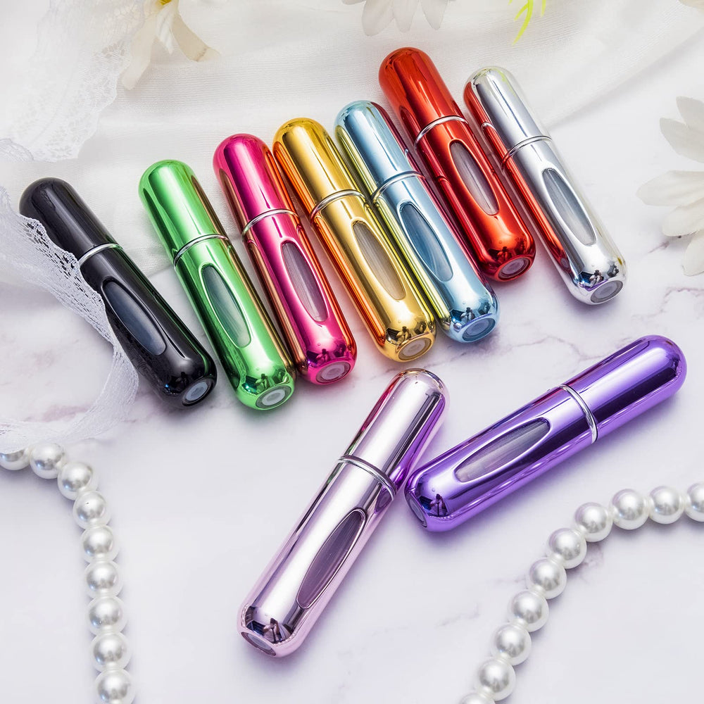 Yamadura four-pack mini spray atomizers for convenient scent swapping.