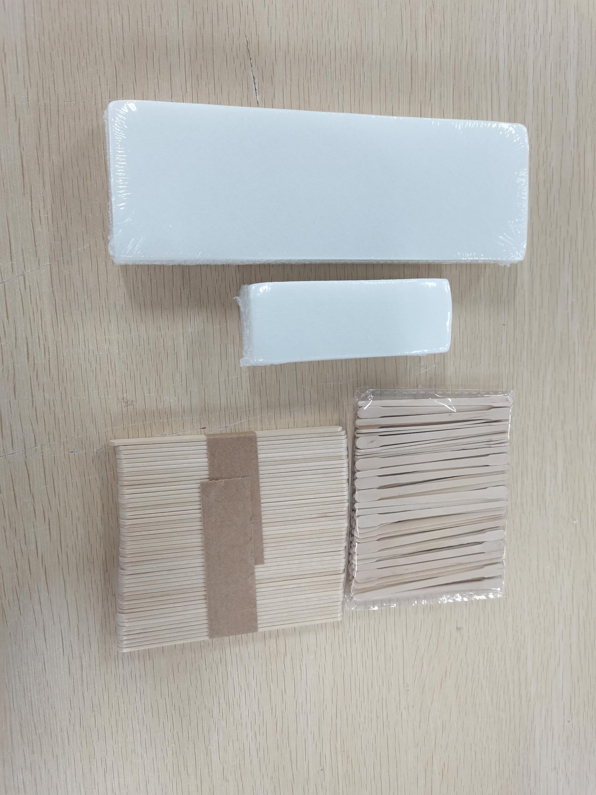 Yaomiao wooden sticks application; clean, even wax distribution.