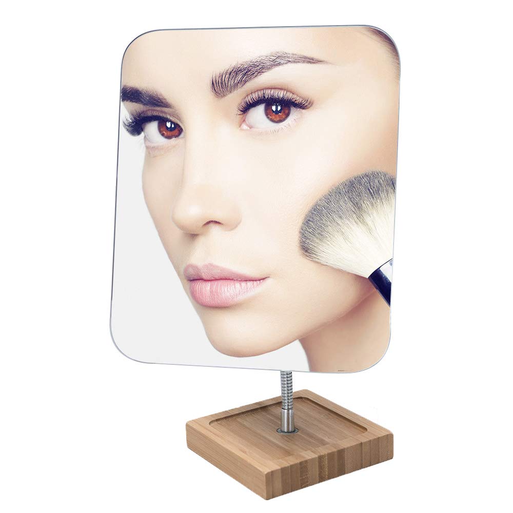 YEAKE Bathroom-ready mirror sits on dressing table for daily grooming.
