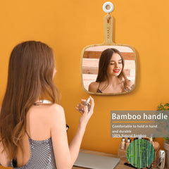 YEAKE hand mirror shows a large viewing area for full-head checks.