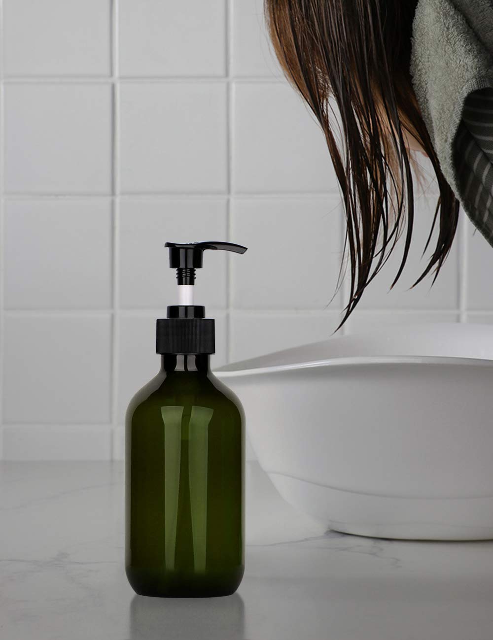 Yebeauty versatile dispenser for shampoo or body wash in kitchen.