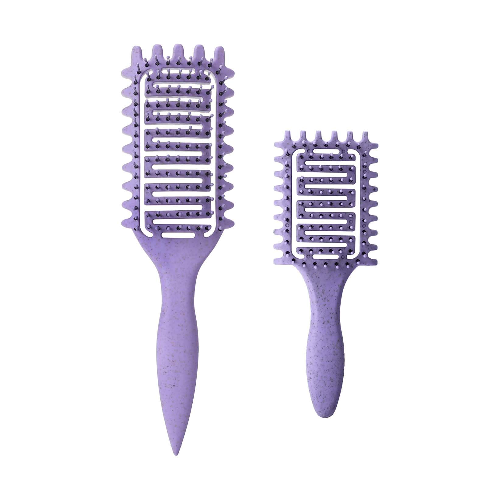 Yingbtr curl-defining brush with ergonomic handle for detangling and shaping curls.