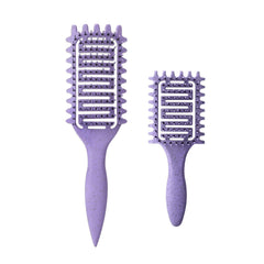 Yingbtr curl-defining brush with ergonomic handle for detangling and shaping curls.