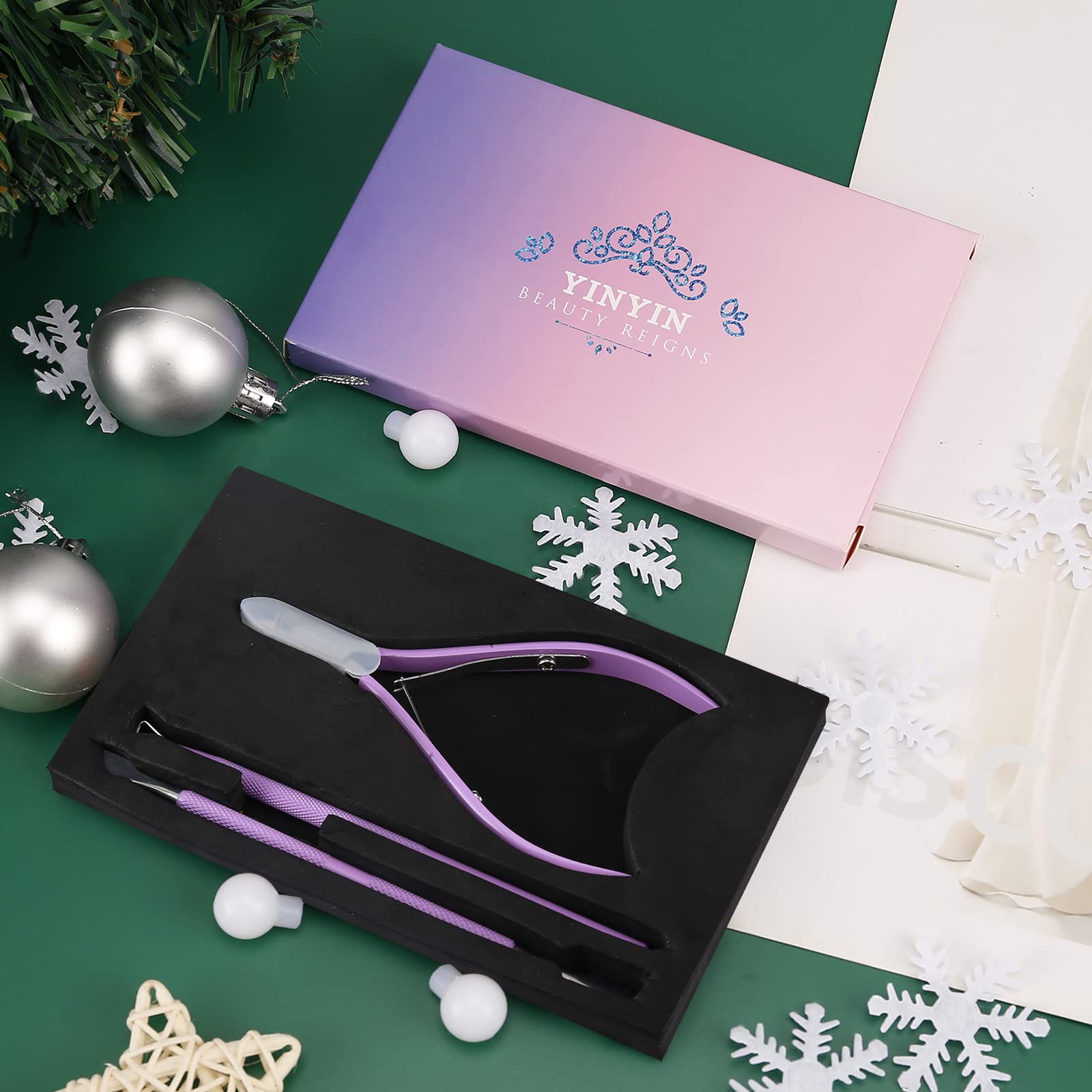 YINYIN Cuticle Trimmer in use, compact purple kit for on-the-go nails.
