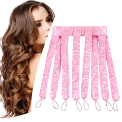 YiQiYi No Heat Curler Headband in pink satin close-up, showing soft fabric and curl potential